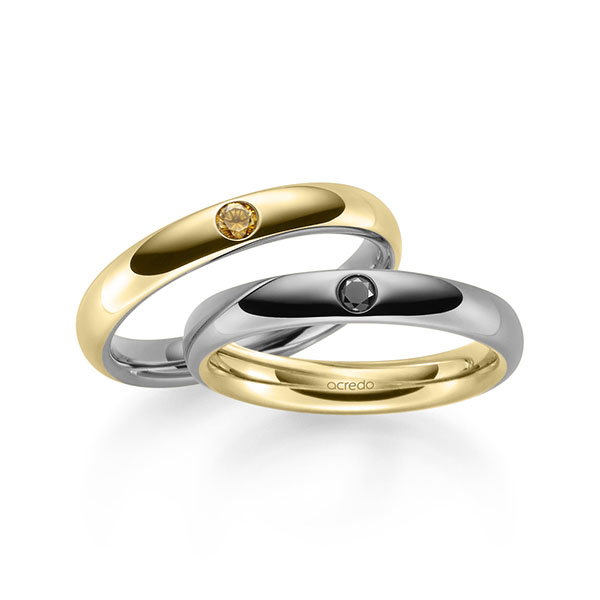 Set Bicolor trouwringen in buiten grijsgoud 14 kt. , binnen geelgoud 14 kt. met in totaal 0,12 ct. Briljant Zwart Cognac van acredo