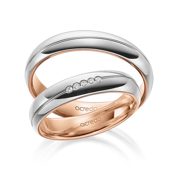 Set Bicolor trouwringen in buiten grijsgoud 14 kt. , binnen roodgoud 14 kt. met in totaal 0,025 ct. Briljant tw/si van acredo
