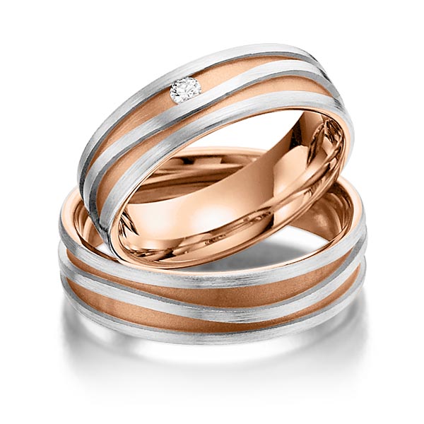 Set Bicolor trouwringen in buiten grijsgoud 14 kt. , binnen roodgoud 14 kt. met in totaal 0,04 ct. Briljant tw/si van Steinberg