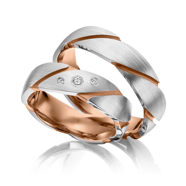 Set Bicolor trouwringen in buiten grijsgoud 14 kt. , binnen roodgoud 14 kt. met in totaal 0,05 ct. Briljant tw/si van Steinberg - T-1065-1 Set Bicolor trouwringen in buiten grijsgoud 14 kt. , binnen roodgoud 14 kt. met in totaal 0,05 ct. Briljant tw/si van Steinberg - T-1065-1