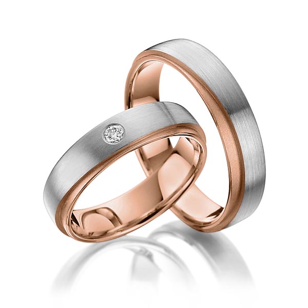 Set Bicolor trouwringen in buiten grijsgoud 14 kt. , binnen roodgoud 14 kt. met in totaal 0,05 ct. Briljant tw/si van Steinberg