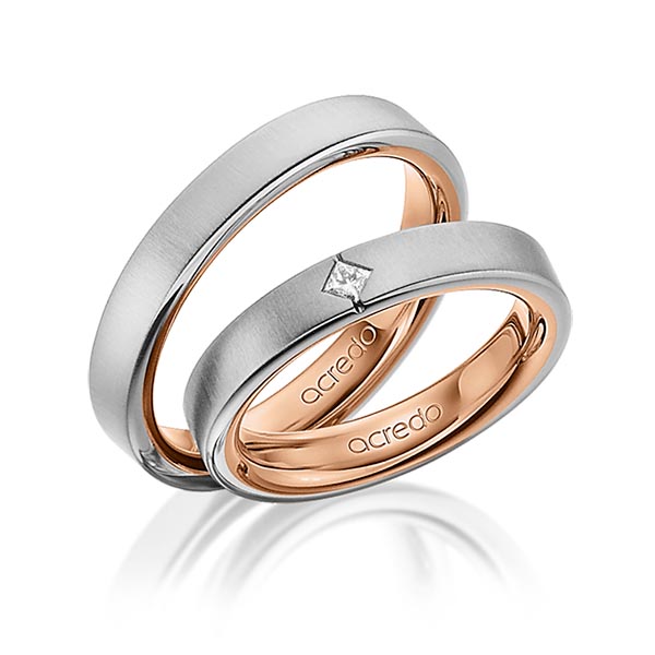 Set Bicolor trouwringen in buiten grijsgoud 14 kt. , binnen roodgoud 14 kt. met in totaal 0,05 ct. Princess-Diamant tw/si van acredo