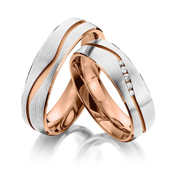 Set Bicolor trouwringen in buiten grijsgoud 14 kt. , binnen roodgoud 14 kt. met in totaal 0,07 ct. Briljant tw/si van Eternal Touch