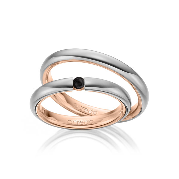 Set Bicolor trouwringen in buiten grijsgoud 14 kt. , binnen roodgoud 14 kt. met in totaal 0,08 ct. Briljant Zwart van acredo