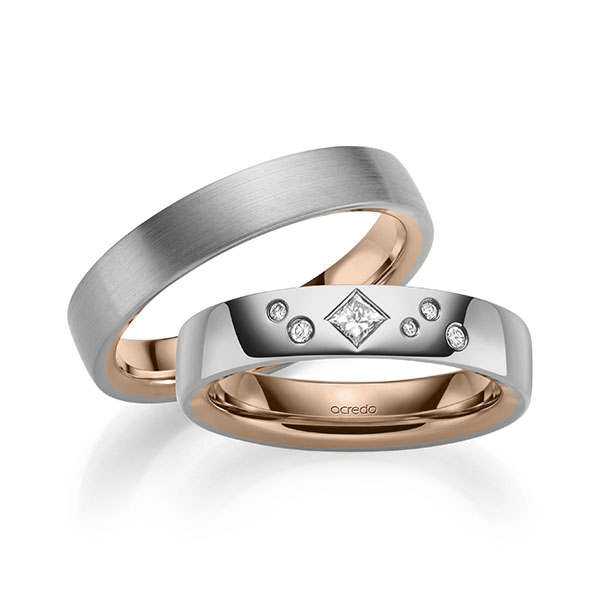 Set Bicolor trouwringen in buiten grijsgoud 14 kt. , binnen roodgoud 14 kt. met in totaal 0,146 ct. Briljant & Princess-Diamant tw/si van acredo - A-2133-3 Set Bicolor trouwringen in buiten grijsgoud 14 kt. , binnen roodgoud 14 kt. met in totaal 0,146 ct. Briljant & Princess-Diamant tw/si van acredo - A-2133-3