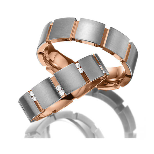 Set Bicolor trouwringen in buiten grijsgoud 14 kt. , binnen roodgoud 14 kt. met in totaal 0,2 ct. Briljant tw/si van Eternal Touch
