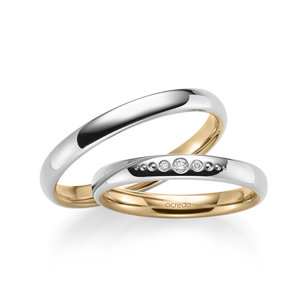 Set Bicolor trouwringen in buiten grijsgoud 14 kt. , binnen roségoud 14 kt. met in totaal 0,036 ct. Briljant tw/si van acredo