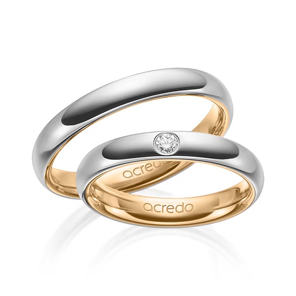 Set Bicolor trouwringen in buiten grijsgoud 14 kt. , binnen roségoud 14 kt. met in totaal 0,06 ct. Briljant tw/si van acredo