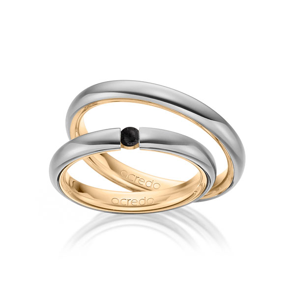 Set Bicolor trouwringen in buiten grijsgoud 14 kt. , binnen roségoud 14 kt. met in totaal 0,08 ct. Briljant Zwart van acredo
