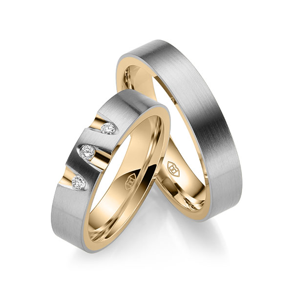 Set Bicolor trouwringen in buiten grijsgoud 14 kt. , binnen roségoud 14 kt. met in totaal 0,09 ct. Briljant tw/si - UQ-1045-3 Set Bicolor trouwringen in buiten grijsgoud 14 kt. , binnen roségoud 14 kt. met in totaal 0,09 ct. Briljant tw/si - UQ-1045-3