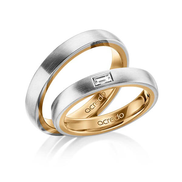 Set Bicolor trouwringen in buiten grijsgoud 14 kt. , binnen roségoud 14 kt. met in totaal 0,15 ct. Baguette-Diamant tw,vs van acredo