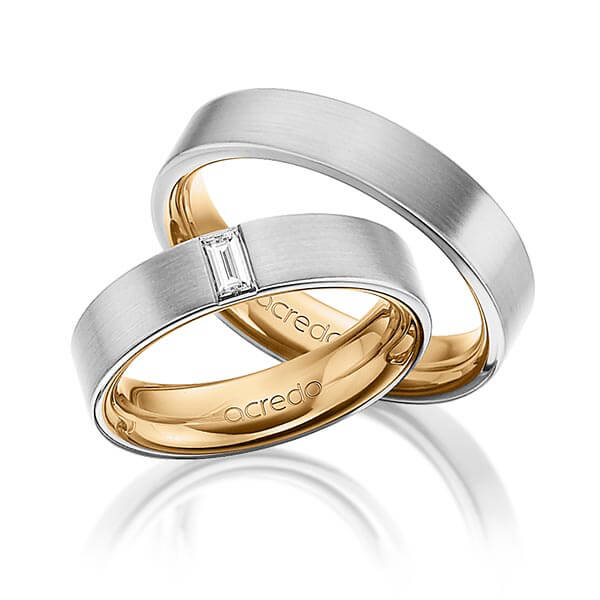Set Bicolor trouwringen in buiten grijsgoud 14 kt. , binnen roségoud 14 kt. met in totaal 0,2 ct. Baguette-Diamant tw,vs van acredo