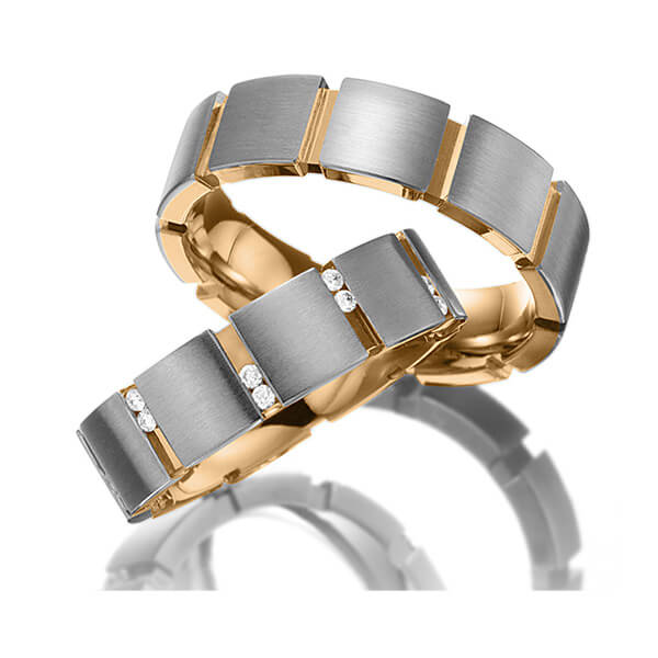Set Bicolor trouwringen in buiten grijsgoud 14 kt. , binnen roségoud 14 kt. met in totaal 0,2 ct. Briljant tw/si van Eternal Touch