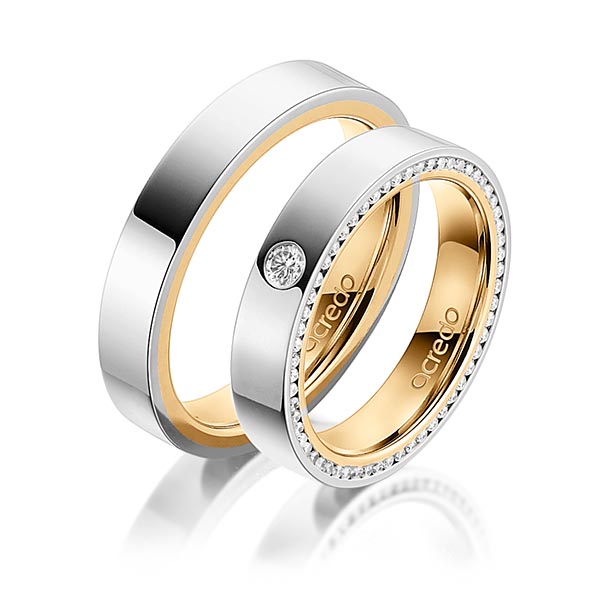 Set Bicolor trouwringen in buiten grijsgoud 14 kt. , binnen roségoud 14 kt. met in totaal 0,395 ct. Briljant tw/si van acredo - A-1541-1 Set Bicolor trouwringen in buiten grijsgoud 14 kt. , binnen roségoud 14 kt. met in totaal 0,395 ct. Briljant tw/si van acredo - A-1541-1
