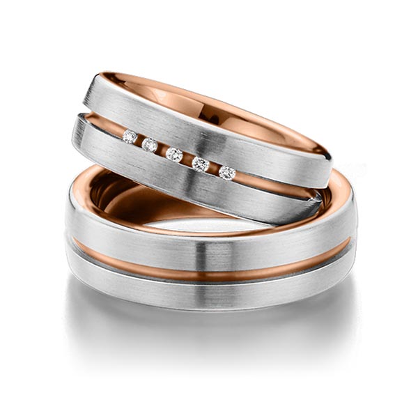 Set Bicolor trouwringen in buiten platina 950 , binnen roodgoud 18 kt. met in totaal 0,075 ct. Briljant tw/si van Eternal Touch