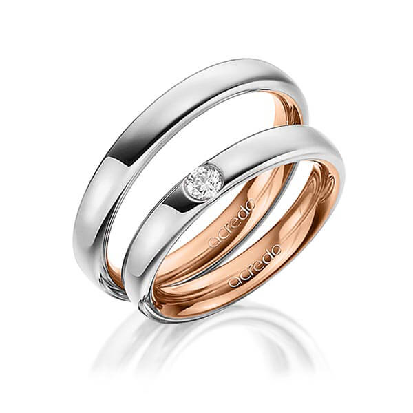 Set Bicolor trouwringen in buiten platina 950 , binnen roodgoud 18 kt. met in totaal 0,12 ct. Briljant tw/si van acredo