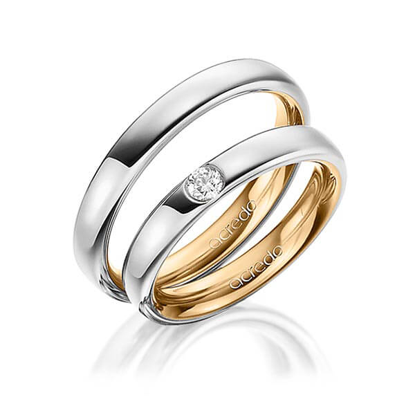 Set Bicolor trouwringen in buiten platina 950 , binnen roségoud 18 kt. met in totaal 0,12 ct. Briljant tw/si van acredo