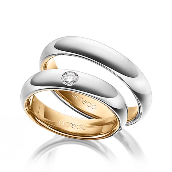 Set Bicolor trouwringen in buiten platina 950 , binnen roségoud 18 kt. met in totaal 0,1 ct. Briljant tw/si van acredo