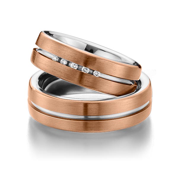 Set Bicolor trouwringen in buiten roodgoud 14 kt. , binnen edelstaal met in totaal 0,075 ct. Briljant tw/si van Eternal Touch