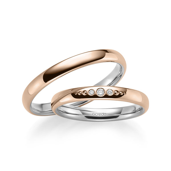 Set Bicolor trouwringen in buiten roodgoud 14 kt. , binnen grijsgoud 14 kt. met in totaal 0,036 ct. Briljant tw/si van acredo