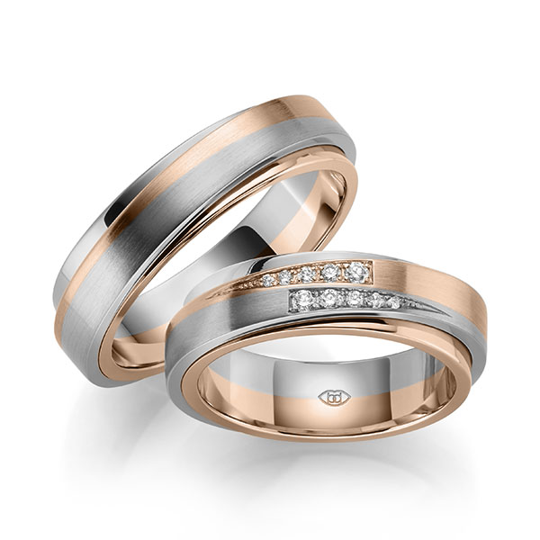 Set Bicolor trouwringen in buiten roodgoud 14 kt. , binnen grijsgoud 14 kt. met in totaal 0,114 ct. Briljant tw,vs tw/si 