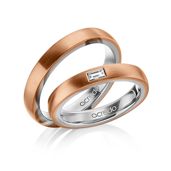 Set Bicolor trouwringen in buiten roodgoud 14 kt. , binnen grijsgoud 14 kt. met in totaal 0,15 ct. Baguette-Diamant tw,vs van acredo