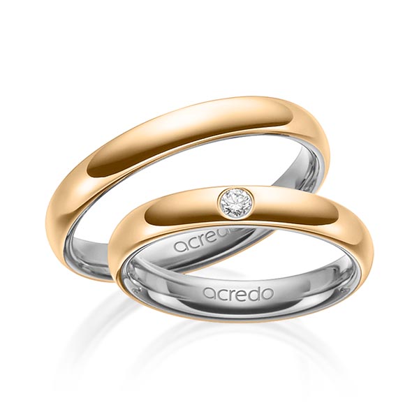 Set Bicolor trouwringen in buiten roségoud 14 kt. , binnen grijsgoud 14 kt. met in totaal 0,06 ct. Briljant tw/si van acredo