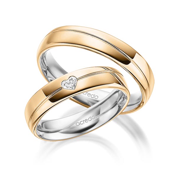 Set Bicolor trouwringen in buiten roségoud 14 kt. , binnen grijsgoud 14 kt. met in totaal 0,1 ct. Hart-Diamant tw,vs van acredo Set Bicolor trouwringen in buiten roségoud 14 kt. , binnen grijsgoud 14 kt. met in totaal 0,1 ct. Hart-Diamant tw,vs van acredo