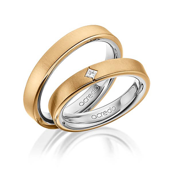 Set Bicolor trouwringen in buiten roségoud 18 kt. , binnen platina 950 met in totaal 0,05 ct. Princess-Diamant tw/si van acredo