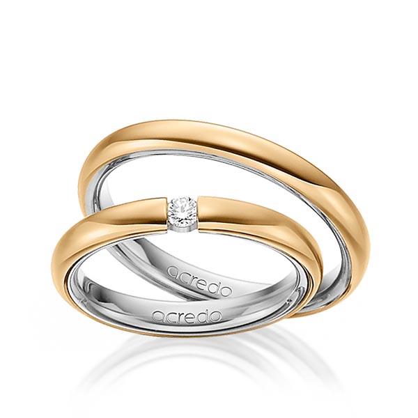 Set Bicolor trouwringen in buiten roségoud 18 kt. , binnen platina 950 met in totaal 0,08 ct. Briljant tw/si van acredo