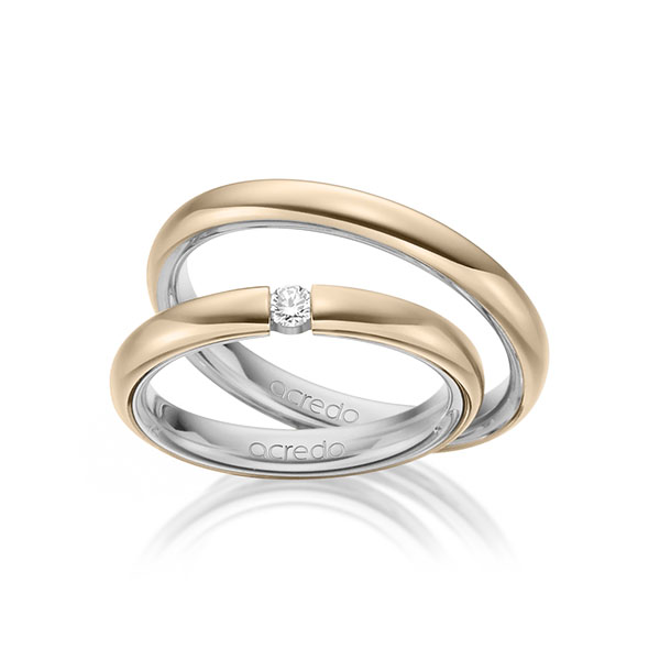 Set Bicolor trouwringen in buiten Signature Goud 585 , binnen grijsgoud 14 kt. met in totaal 0,08 ct. Briljant tw/si van acredo