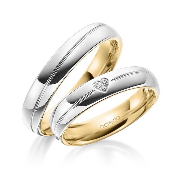 Set Bicolor trouwringen in buiten witgoud 14 kt. , binnen geelgoud 14 kt. met in totaal 0,021 ct. Briljant tw/si van acredo