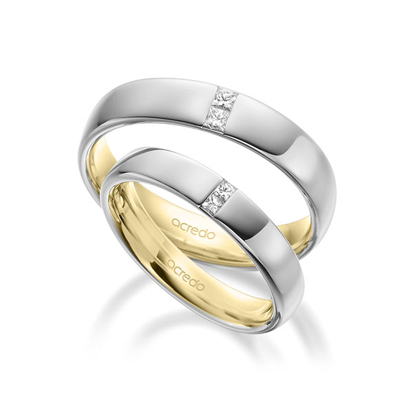 Set Bicolor trouwringen in buiten witgoud 14 kt. , binnen geelgoud 14 kt. met in totaal 0,18 ct. Princess-Diamant tw/si van acredo