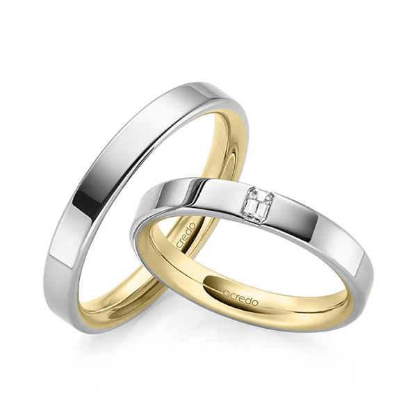 Set Bicolor trouwringen in buiten witgoud 14 kt. , binnen geelgoud 14 kt. met in totaal 0,1 ct. tw,vs van acredo