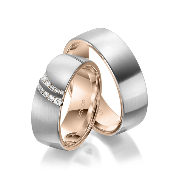 Set Bicolor trouwringen in buiten witgoud 14 kt. , binnen roodgoud 14 kt. met in totaal 0,116 ct. Briljant tw/si van acredo - A-1967-11 Set Bicolor trouwringen in buiten witgoud 14 kt. , binnen roodgoud 14 kt. met in totaal 0,116 ct. Briljant tw/si van acredo - A-1967-11