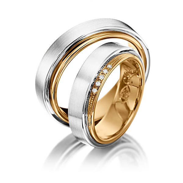 Set Bicolor trouwringen in buiten witgoud 14 kt. , binnen roségoud 14 kt. met in totaal 0,04 ct. Briljant tw/si van Eternal Touch - P-1064-11 Set Bicolor trouwringen in buiten witgoud 14 kt. , binnen roségoud 14 kt. met in totaal 0,04 ct. Briljant tw/si van Eternal Touch - P-1064-11