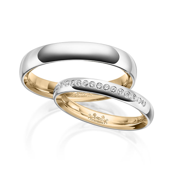 Set Bicolor trouwringen in buiten witgoud 14 kt. , binnen roségoud 14 kt. met in totaal 0,16 ct. Briljant tw/si van Steinberg