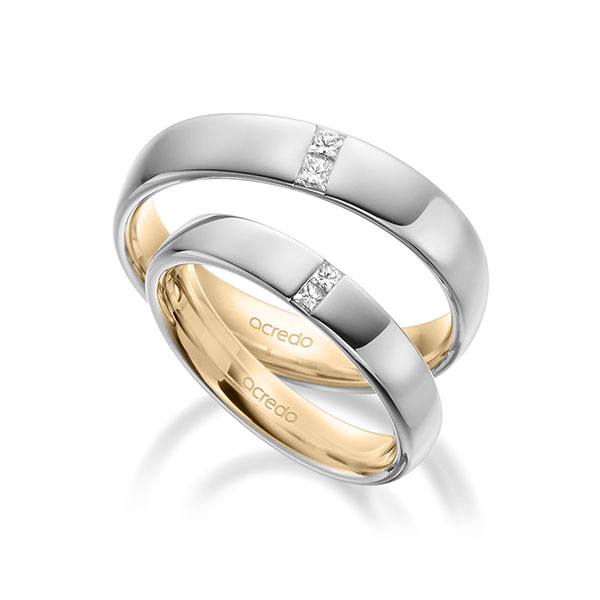 Set Bicolor trouwringen in buiten witgoud 14 kt. , binnen roségoud 14 kt. met in totaal 0,18 ct. Princess-Diamant tw/si van acredo