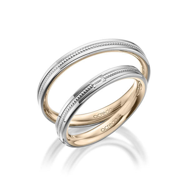 Set Bicolor trouwringen in buiten witgoud 14 kt. , binnen Signature Goud 585 met in totaal 0,05 ct. Baguette-Diamant tw,vs van acredo