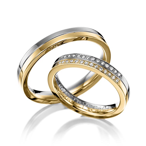 Set Bicolor trouwringen in dark grey gold 14 kt. geelgoud 14 kt. met in totaal 0,14 ct. Briljant tw/si van Eternal Touch