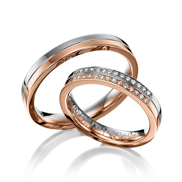 Set Bicolor trouwringen in dark grey gold 14 kt. roodgoud 14 kt. met in totaal 0,14 ct. Briljant tw/si van Eternal Touch