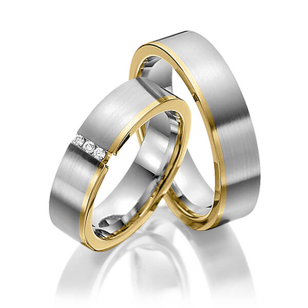 Set Bicolor trouwringen in edelstaal geelgoud 14 kt. met in totaal 0,045 ct. Briljant tw/si van Eternal Touch