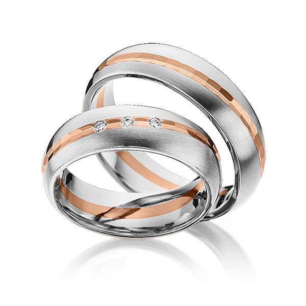 Set Bicolor trouwringen in edelstaal roodgoud 14 kt. met in totaal 0,045 ct. Briljant tw/si van Eternal Touch