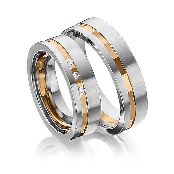 Set Bicolor trouwringen in edelstaal roségoud 14 kt. met in totaal 0,045 ct. Briljant tw/si van Eternal Touch