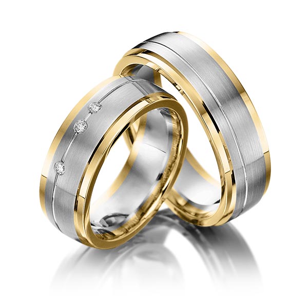 Set Bicolor trouwringen in geelgoud 14 kt. dark grey gold 14 kt. met in totaal 0,045 ct. Briljant tw/si van Steinberg