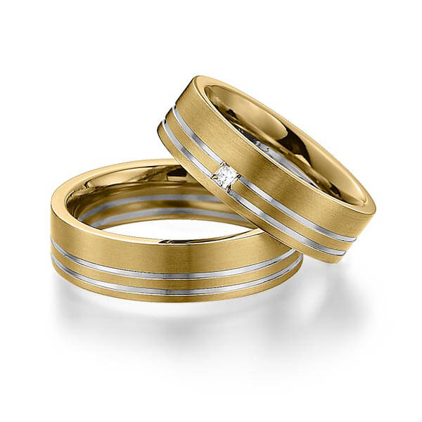 Set Bicolor trouwringen in geelgoud 14 kt. dark grey gold 14 kt. met in totaal 0,06 ct. Princess-Diamant tw/si van Eternal Touch