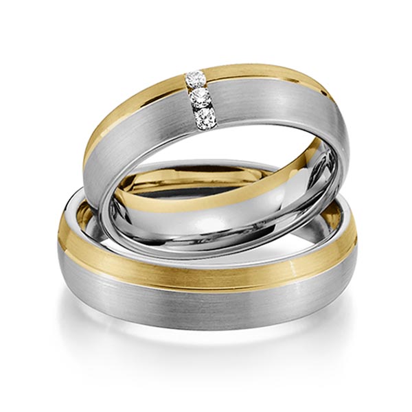 Set Bicolor trouwringen in geelgoud 14 kt. dark grey gold 14 kt. met in totaal 0,075 ct. Briljant tw/si van Steinberg