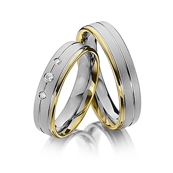Set Bicolor trouwringen in geelgoud 14 kt. dark grey gold 14 kt. met in totaal 0,08 ct. Briljant tw/si van Steinberg