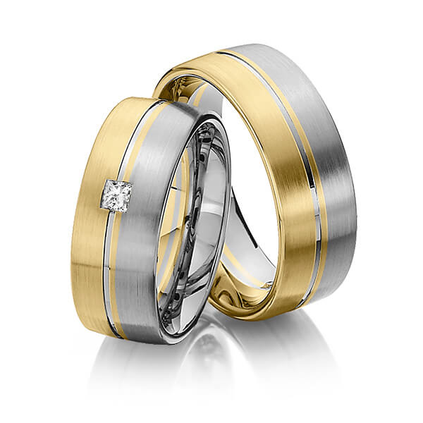 Set Bicolor trouwringen in geelgoud 14 kt. dark grey gold 14 kt. met in totaal 0,12 ct. Princess-Diamant tw/si van Steinberg