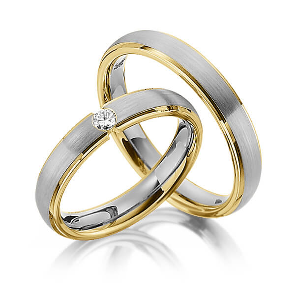 Set Bicolor trouwringen in geelgoud 14 kt. dark grey gold 14 kt. met in totaal 0,1 ct. Briljant tw/si van Steinberg